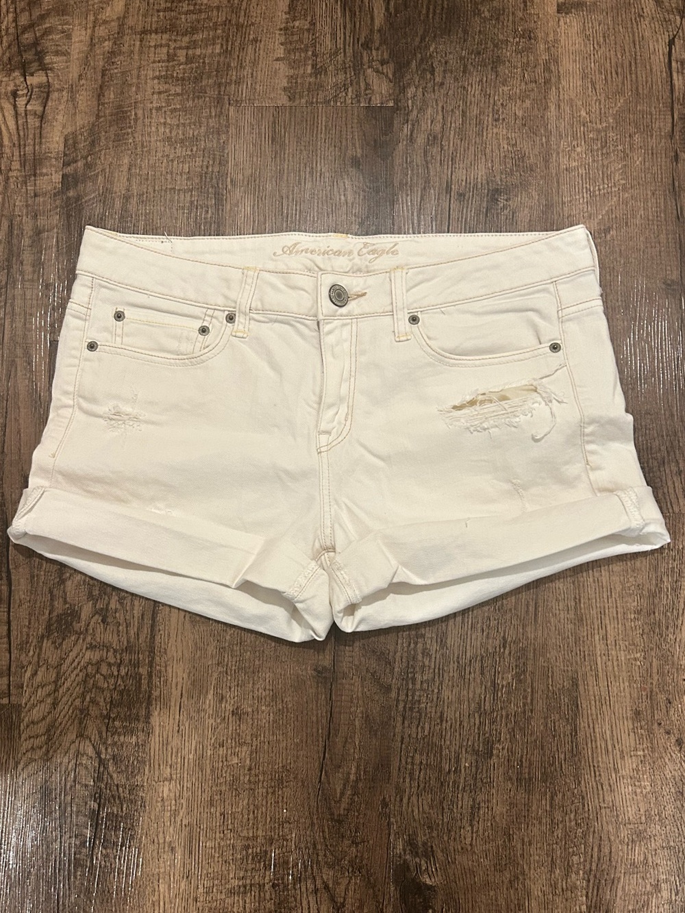 American Eagle Outfitters Cream Distressed Denim Shorts